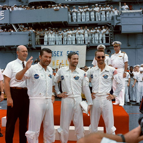 Apollo_7_crew_is_welcomed_aboard_the_USS_Essex.jpg